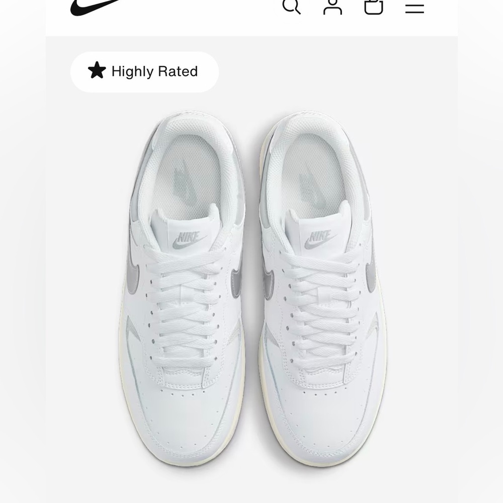Nike White Low-Top Sneakers with Silver Swoosh